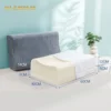 Natural latex contour pillow with high neck support wave design on a minimalist bed setting.