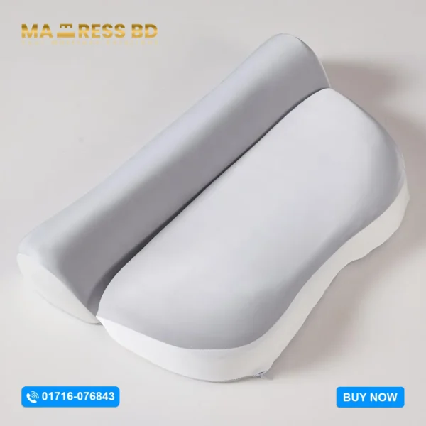 Ergonomic memory cervical pillow with contoured neck support curve.