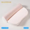 Ergonomic memory cervical pillow with contoured neck support curve.